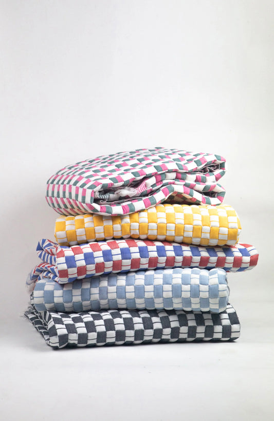 Geocheck Bauhaus Quilted Blanket in Trumpet Archive New York