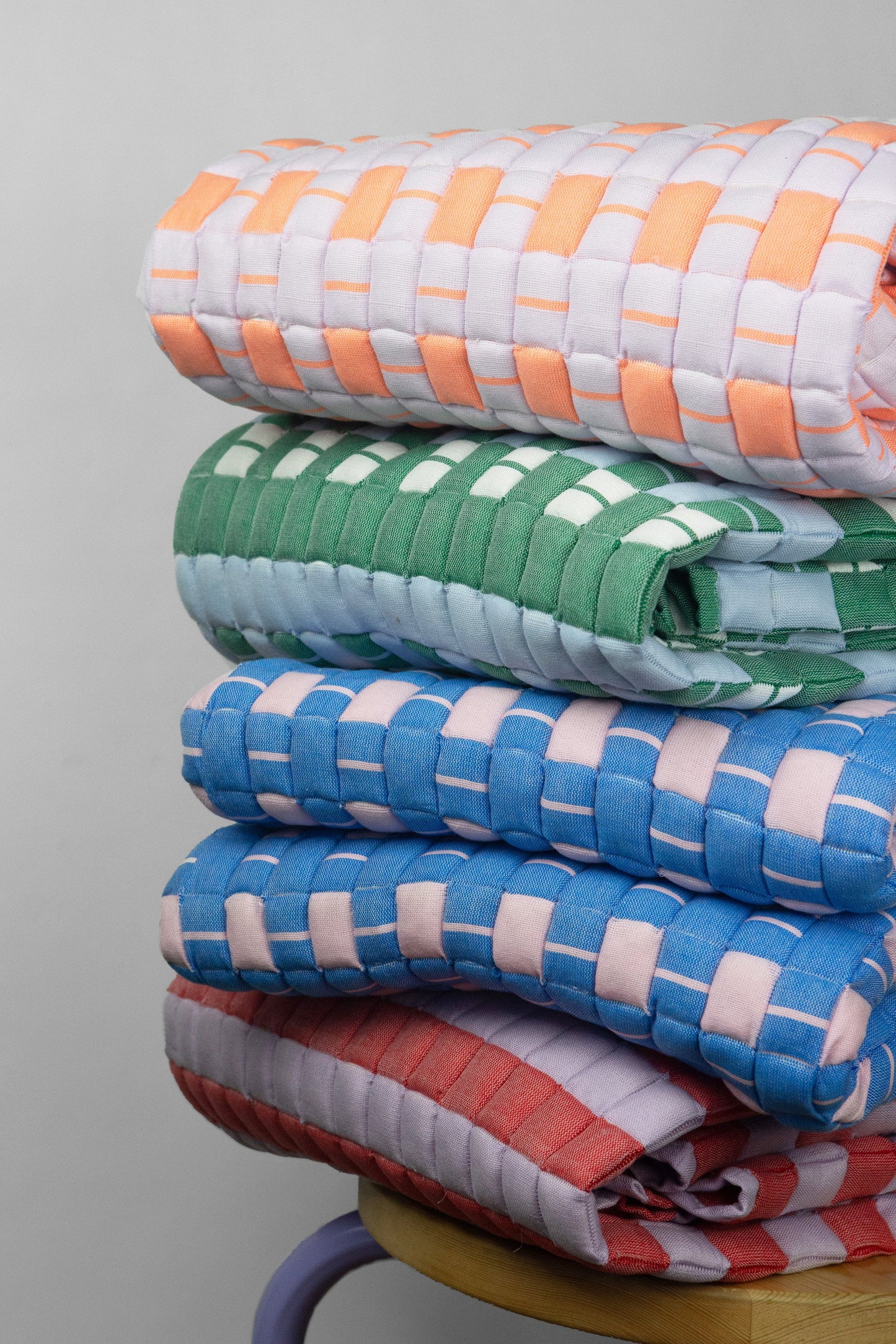 Postmodern Quilted Blanket in Rebel