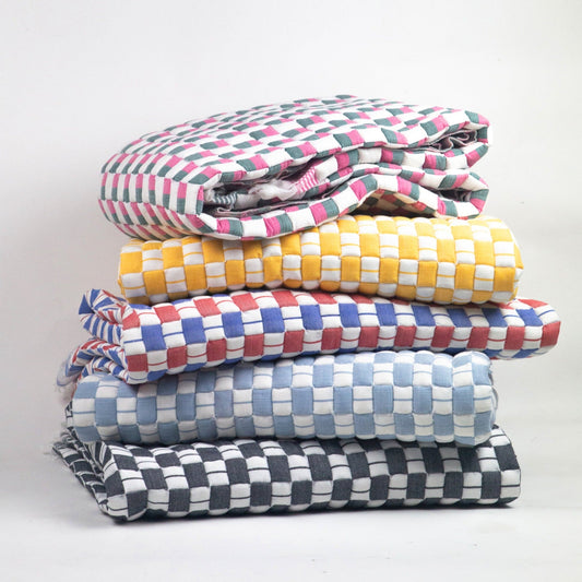 Geocheck Bauhaus Quilted Blanket in Ice