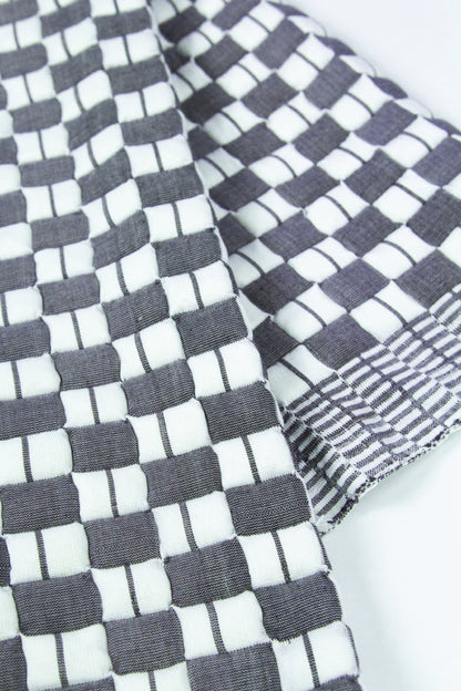 Geocheck Bauhaus Quilted Blanket in Pewter