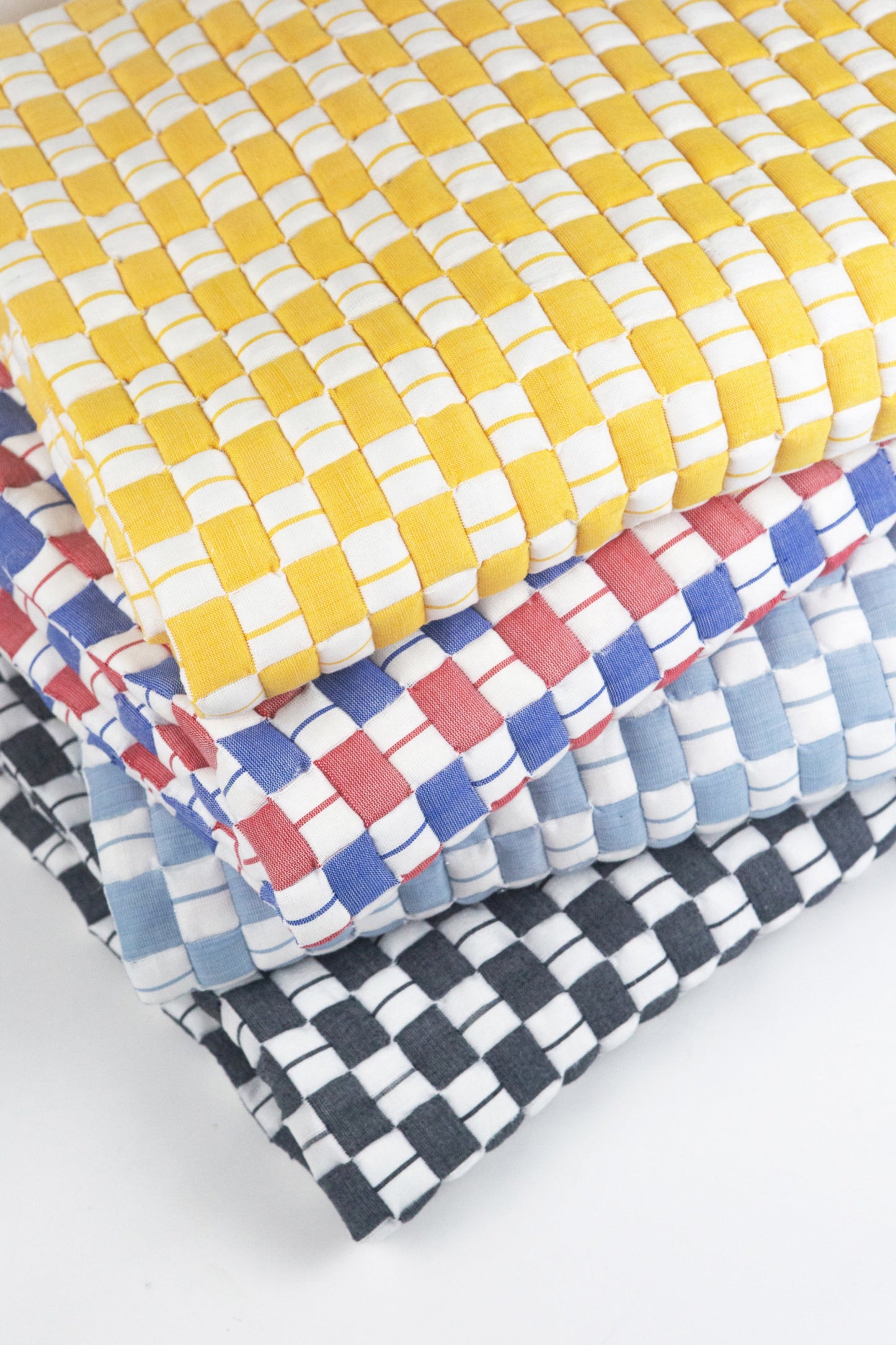 Geocheck Bauhaus Quilted Blanket in Ice
